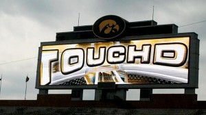 The video frame on the South end zone scoreboard at Kinnick Stadium will go full screen with this graphic following Iowa touchdowns during home games this fall.